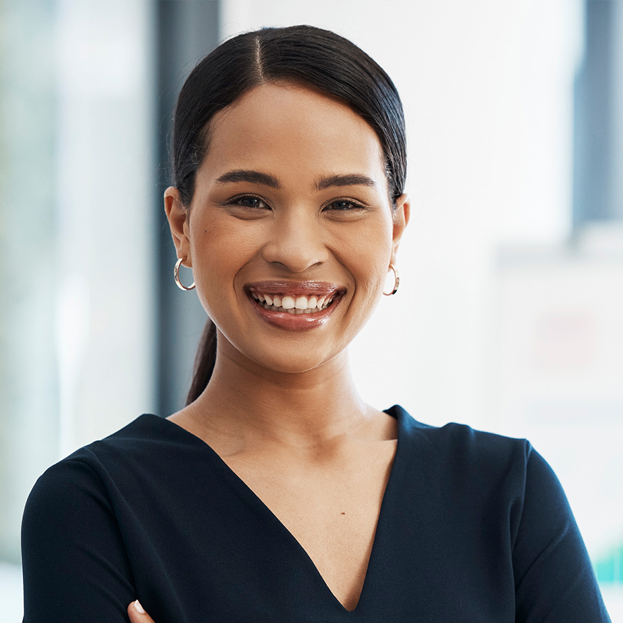 confident-happy-and-smiling-business-woman-standin-WQ254GW.jpg